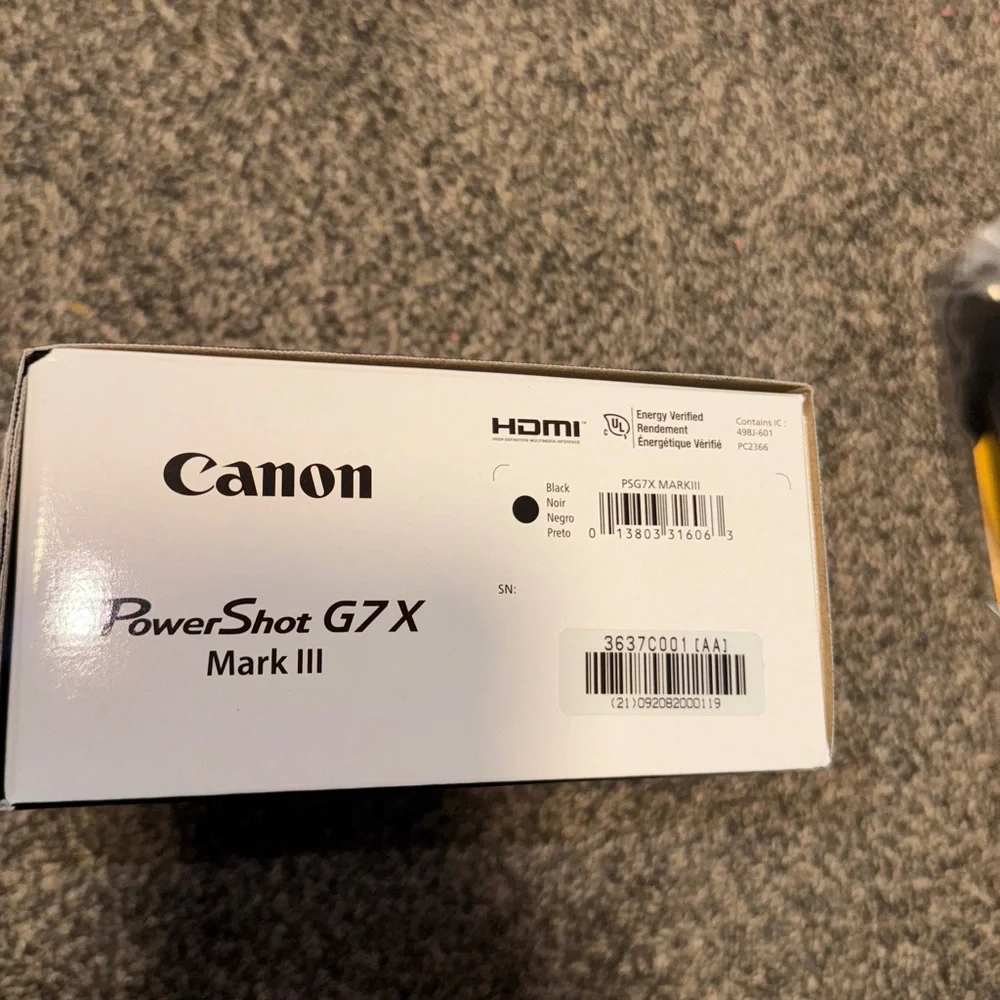 Canon G7X iii with pink cover and a black case
